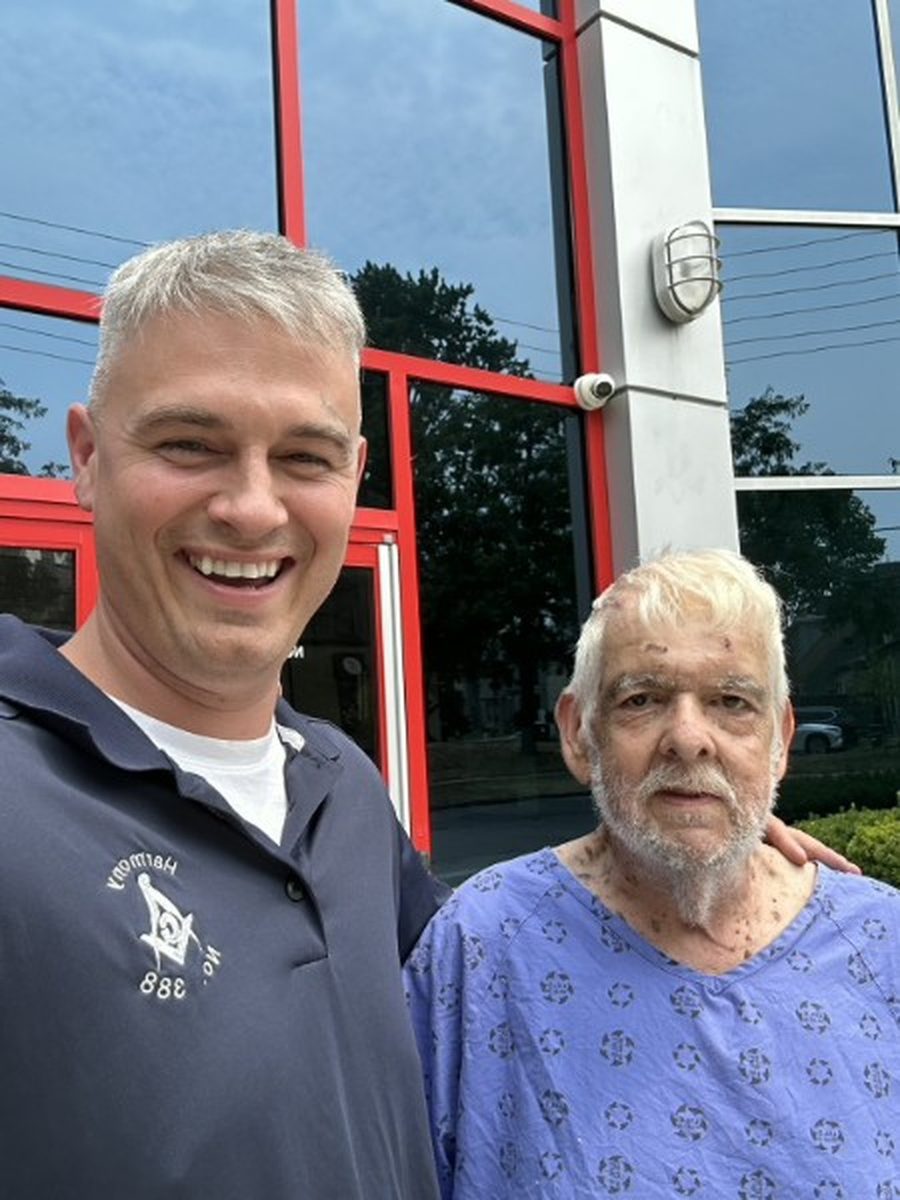 Mike with a grateful homeowner he helped through a difficult sale